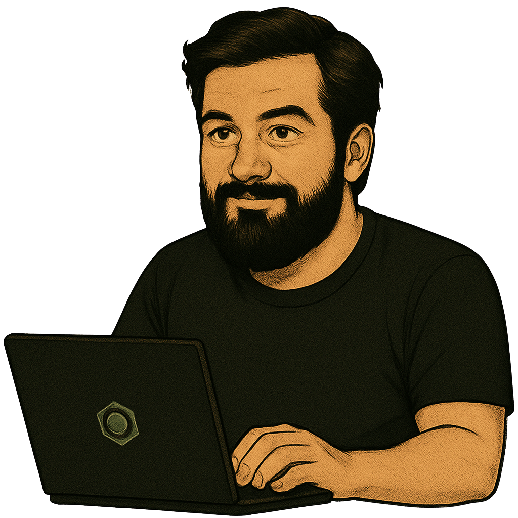 TBD 'TBD' working on a laptop with perfect beard
